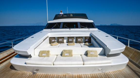 Enjoy the sun on the spacious foredeck of Sandi IV with a motor yacht rental in Italy.